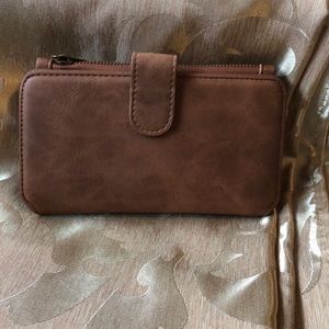 Woman’s magnetic wallet for smart phone.